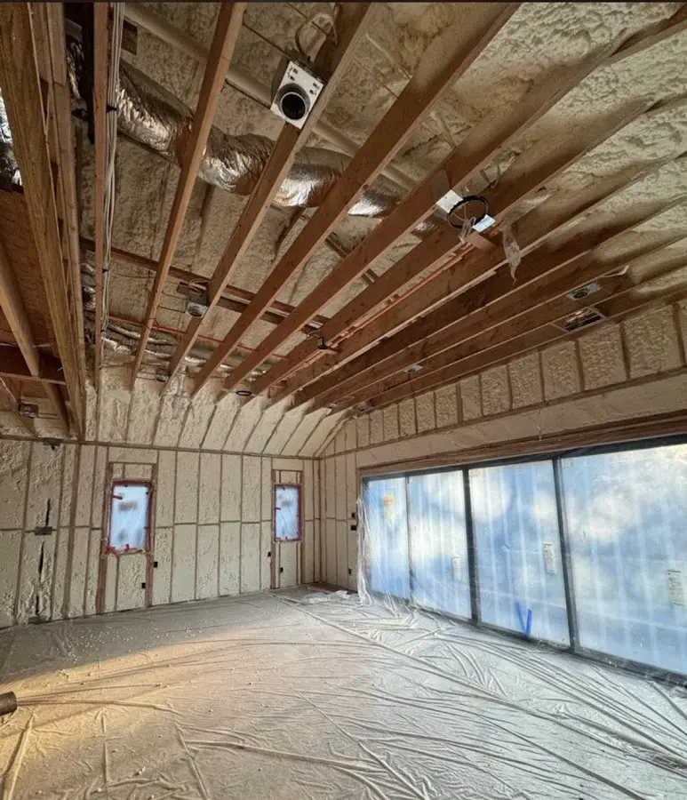 Interior walls and ceiling insulated with spray foam during new construction in Paulsboro